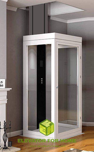 Home elevator featuring glass panels and a control panel on one side.