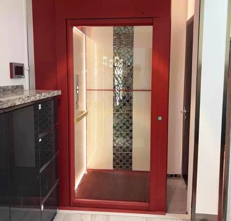 a domestic home elevator cabin with red frame