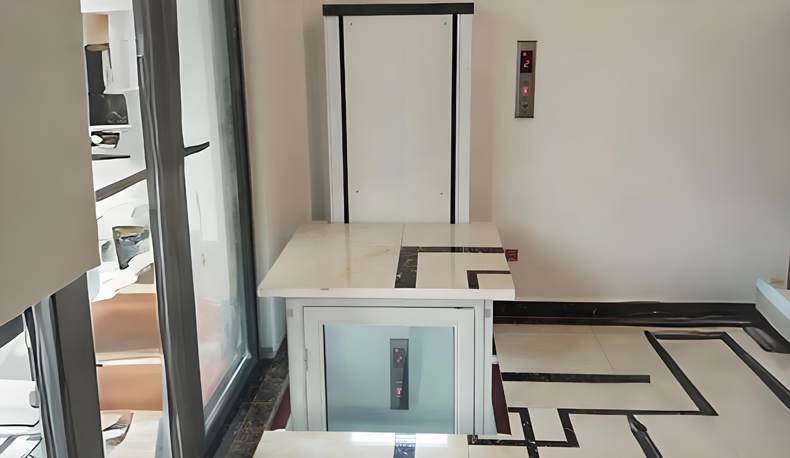 a white home elevator installed inside a home corner