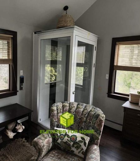 a small white elevator for a home