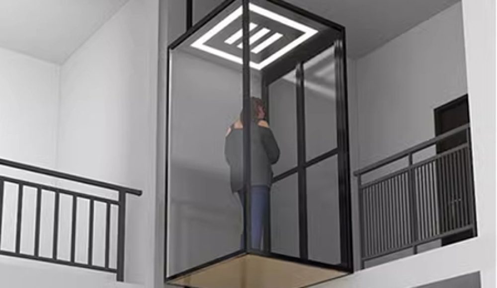 A modern home elevator featuring a glass enclosure and a person standing inside it.