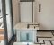 a white home elevator installed inside a home corner