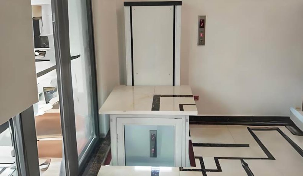 a white home elevator installed inside a home corner
